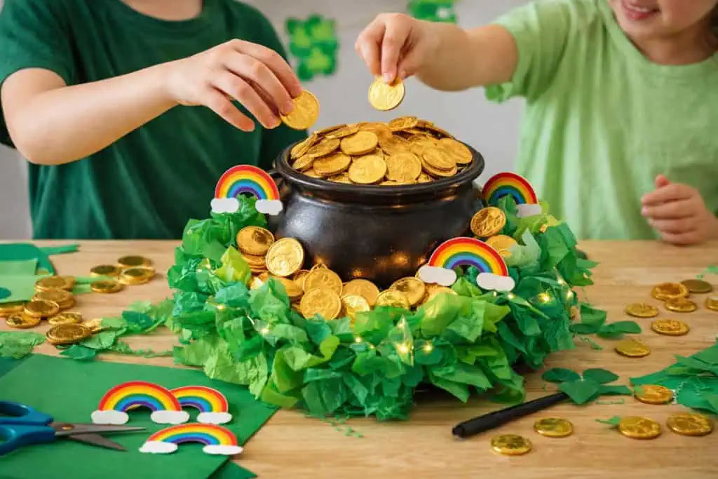 Kids crafting a homemade pot of gold for St. Patrick's Day celebrations.